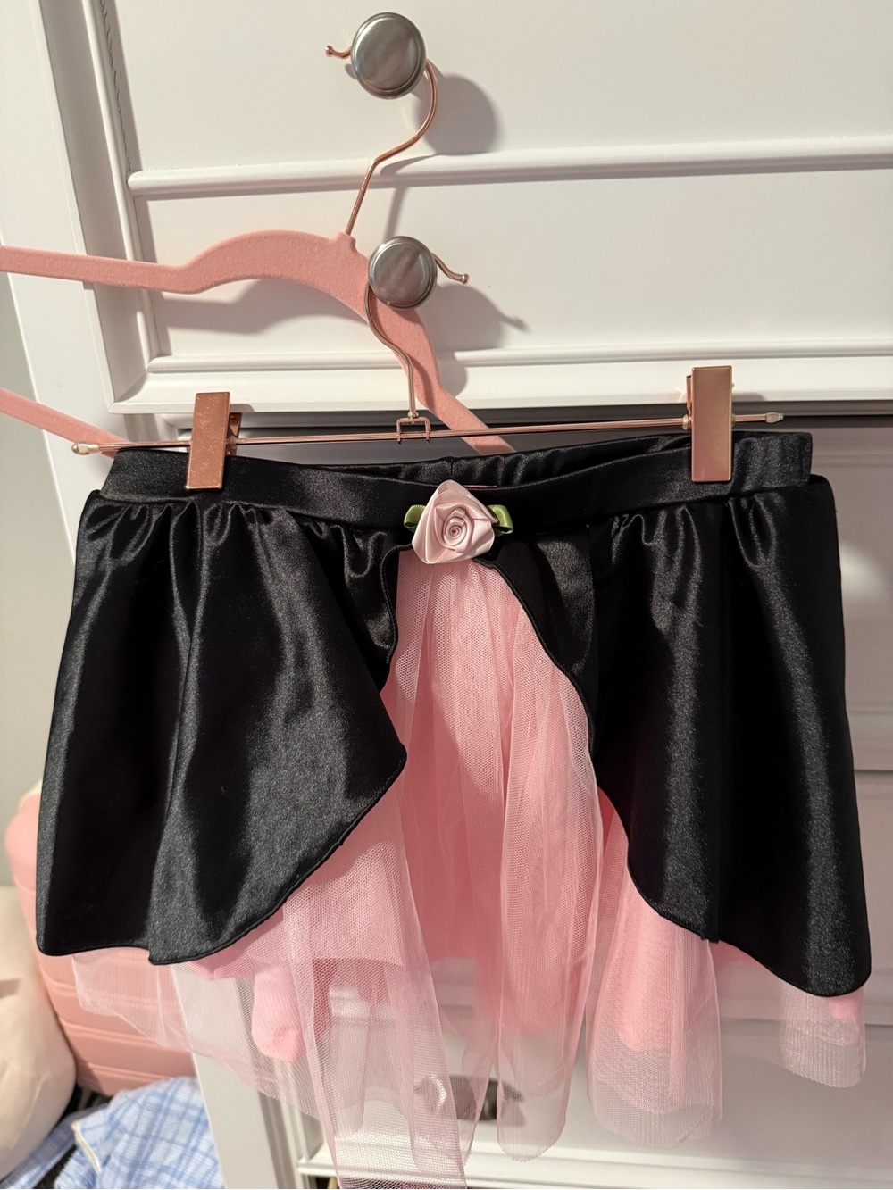 Black Sugar Thrillz satin skirt with pink tulle lining and rose detail